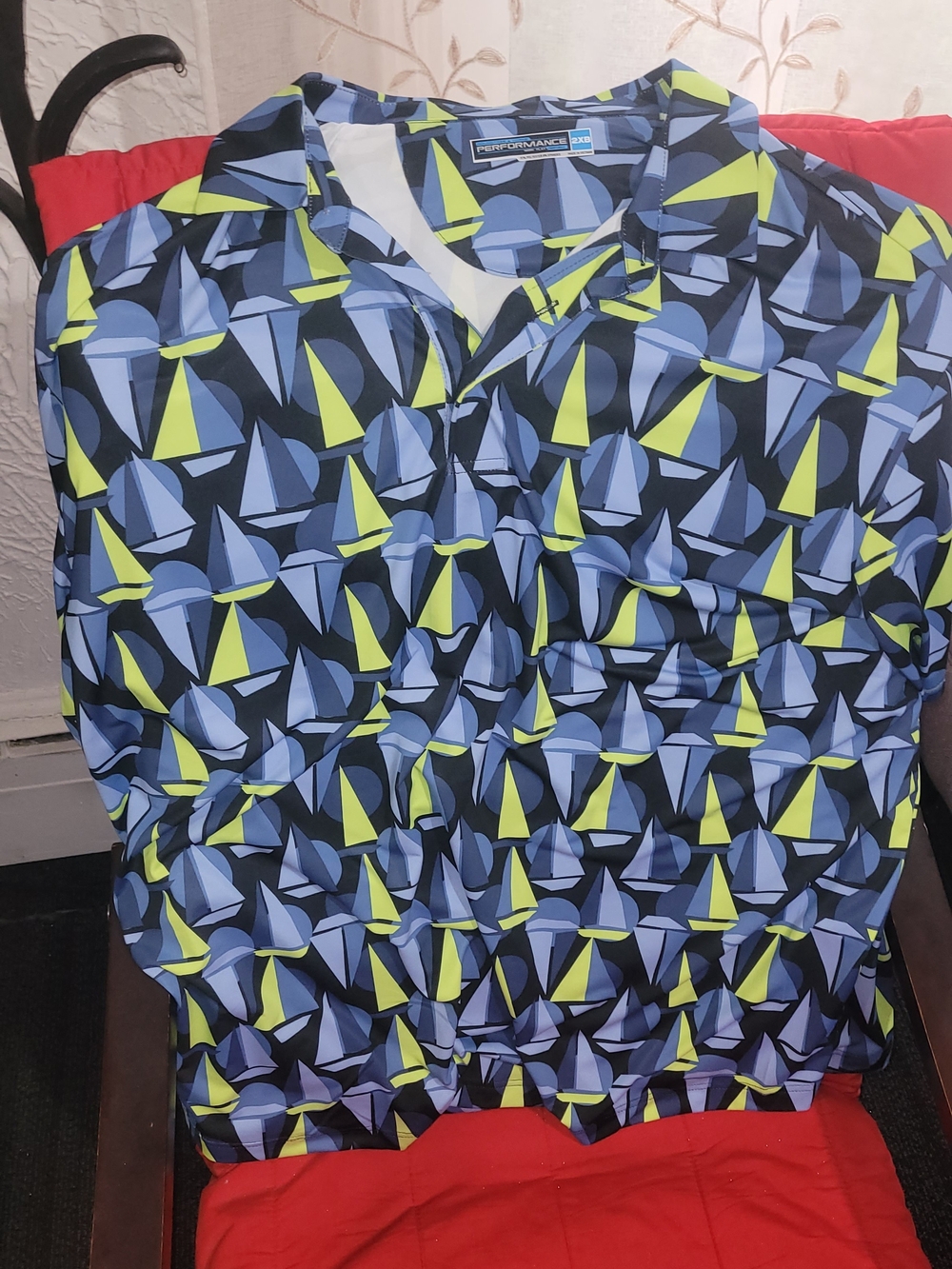 Roundtree & Yorke Black Polo with Blue and Neon Yellow Geometric Print